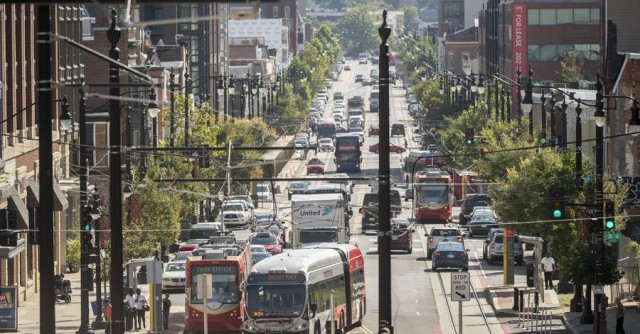 Streetcars and other traffic on H Street.